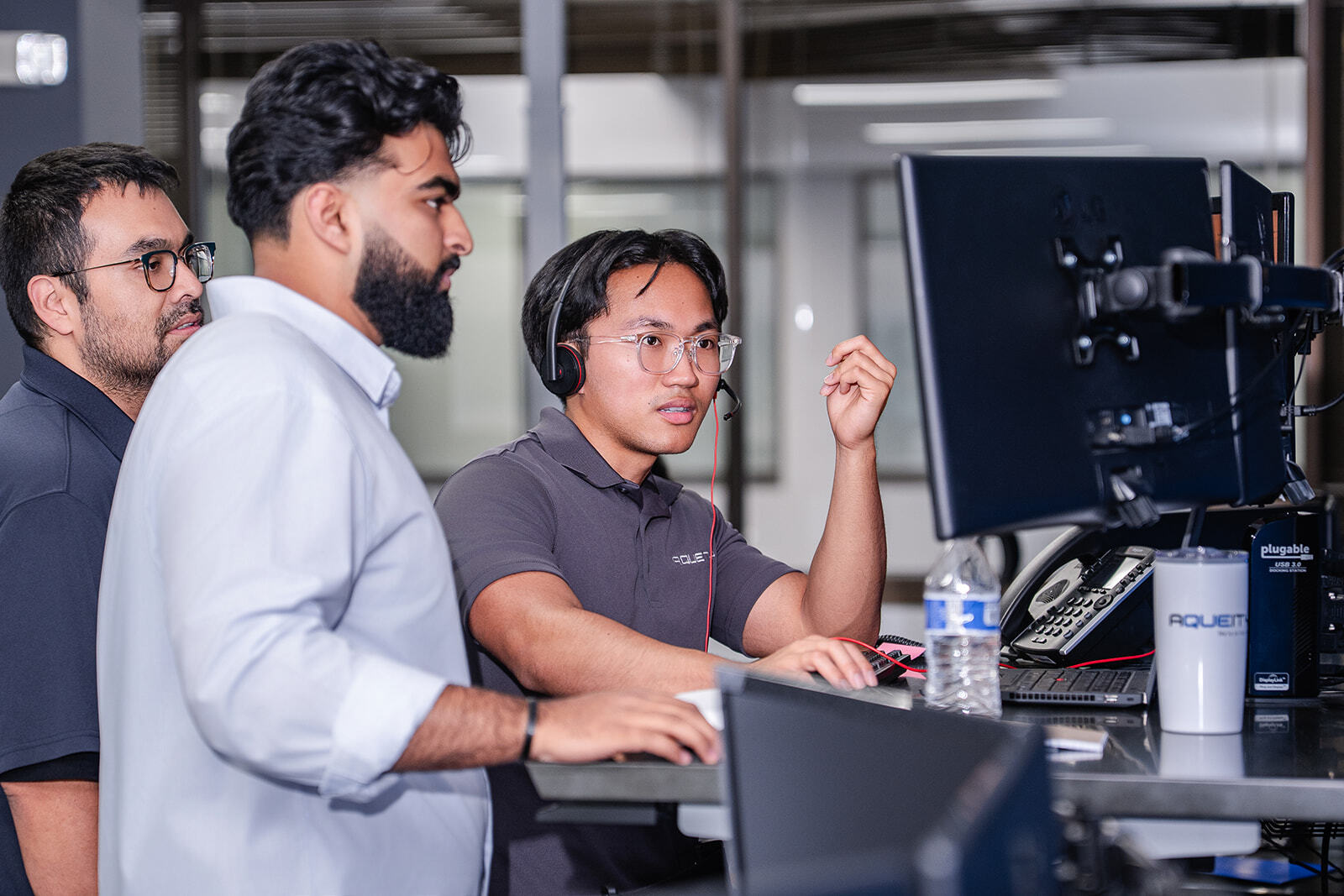 IT Professionals checking work