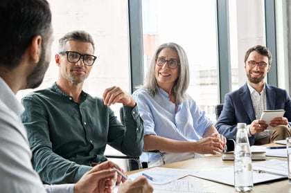 Executive team business people listening to ceo negotiating discussing project_449751525-min
